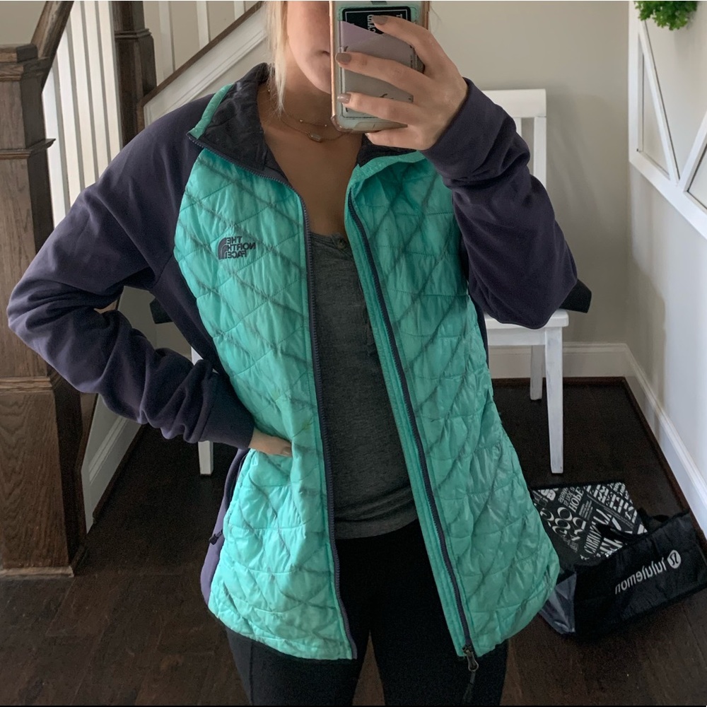 Teal and Purple north face jacket
